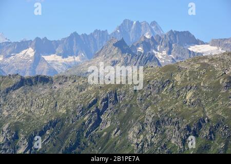 The Lauteraarhorn (centre) and Schreckhorn (right) in the Bernese Oberland viewed from the Furka Pass, Switzerland Stock Photo