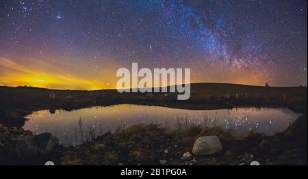 Landscape with Milky way galaxy in Lithuania Stock Photo