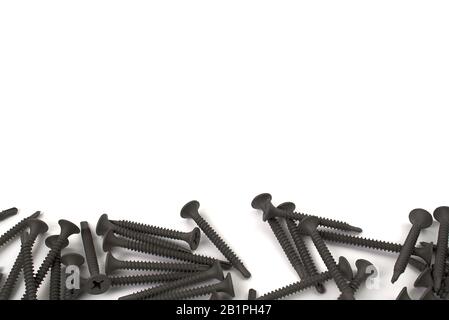 drywall Screw isolated on white background. black screw for metal Stock Photo