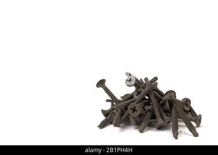 drywall Screw isolated on white background. black screw for metal Stock Photo