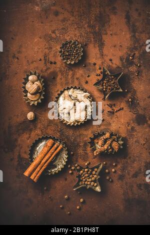 Turkish traditional seven spice Yedi Bahar mix over rusty background Stock Photo