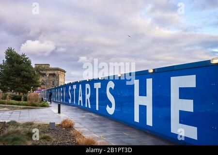 The existing Curzon Street station building in Digbeth area of Birmingham that will form part of the new HS2 railway with site posters Stock Photo