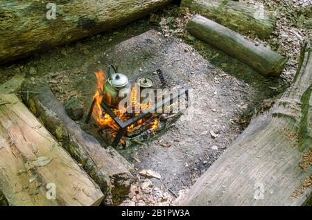 Cooking Tea in Camping Stock Photo