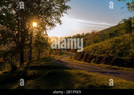 Sunset on a lonely road.Pyrenees.Spain Stock Photo
