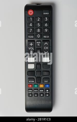 Black tv remote control close up view isolated on white background Stock Photo