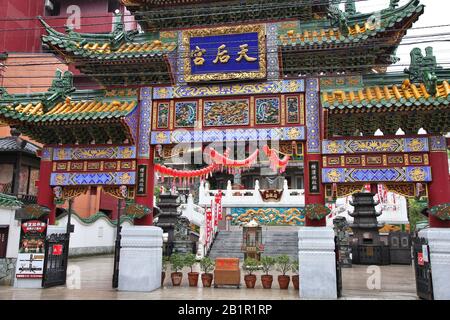 YOKOHAMA, JAPAN - MAY 10, 2012: Monument in Chinatown of Yokohama, Japan. Yokohama's Chinatown is the largest in Japan and a popular tourism attractio Stock Photo