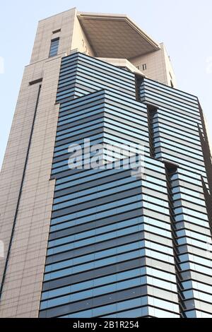 OSAKA, JAPAN - APRIL 24, 2012: Nissei Dowa Sompo Phoenix Tower skyscraper in Osaka, Japan. It was designed by Nikken Sekkei architectural firm. Stock Photo