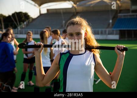 Female hockey player before the match on the field Stock Photo