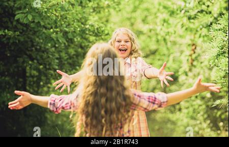 My dear friend. Happy girls excited see each other. Give me hug. Glad to meet you. Finally together. Happy reunion concept. Best friends forever. Happy kids running meet each other. Sincere emotions. Stock Photo