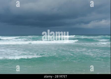 Waves from the Atlantic crashing onto the beach at Europie, Port of Ness, Isle of Lewis, Scotland Stock Photo