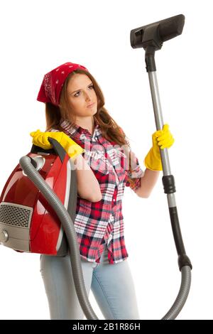 Sad woman works with vacuum cleaner isolated over white background Stock Photo