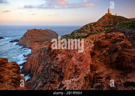 Capo Sandalo Lighthouse at the westernmost point of San Pietro Island, Italy, Sardegna Stock Photo