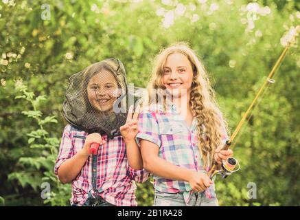 Having fun. Fly fishing. Kids spend time together fishing. Fishing ...