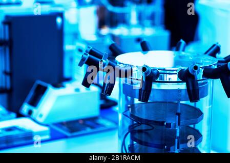 pharmaceutical industry. Production line machine conveyor at factory with bottles. Stock Photo