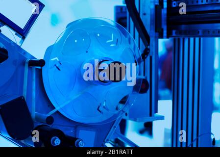 Sticker label printer. Barcode digital printer and applicator machine Stock Photo