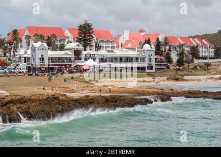 PORT ELIZABETH, SOUTH AFRICA - Restaurants and pubs at the Beachfront Boardwalk in Summerstrand Port Elizabeth with people taking a morning stroll  - Stock Photo