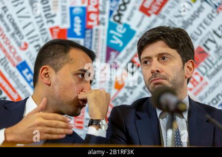 Rome, Italy. 27th Feb 2020. Italian Foreign Secretary Luigi Di Maio (left) whispers to Health Secretary Roberto Speranza during a question and answer session to the foreign press regarding Italy's response to the current Coronavirus Covid-19 outbreak in the country where there are now more than 400 confirmed cases Credit: Stephen Bisgrove/Alamy Live News Stock Photo