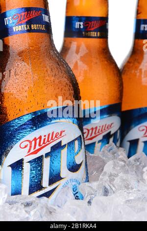 IRVINE, CA - MAY 30, 2014: Closeup of Miller Light beer bottles in ice. Introduced in 1975 Miller Lite was one of the first Reduced Calorie beers to b Stock Photo