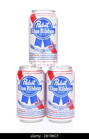 IRVINE, CALIFORNIA - MARCH 16, 2017: Pabst Blue Ribbon Beer. Three stacked cans of the American brand introduced in 1884 in Milwaukee, currently based Stock Photo
