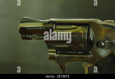 revolver gun ready to shoot on black background Stock Photo