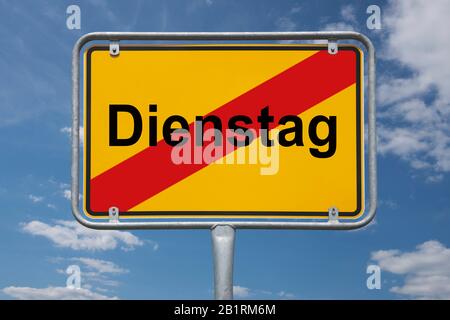 Inscription Dienstag (Tuesday) on a traffic sign, place-name sign Germany, end of the town Stock Photo