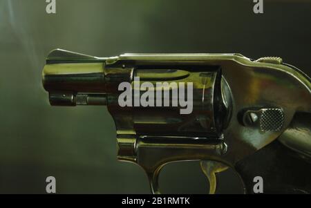 revolver gun ready to shoot on black background Stock Photo