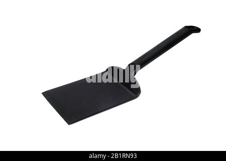 a black plastic spatula for cooking or serving food on a white background Stock Photo