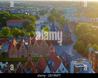 View of the salt reservoir and Holstentor on the river Trave, Hanseatic City of Lübeck, Schleswig-Holstein, Germany, Stock Photo