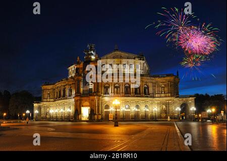 Illuminated Semperoper with fireworks on Theaterplatz, night shot, Dresden, Free State of Saxony, Germany, Stock Photo