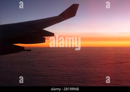 View from the plane, cloud fields, sunset Stock Photo