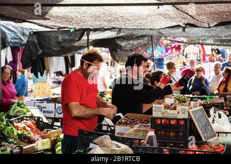 Fruit and veg stall at the outdoor market on a street in Vélez-Málaga Stock Photo