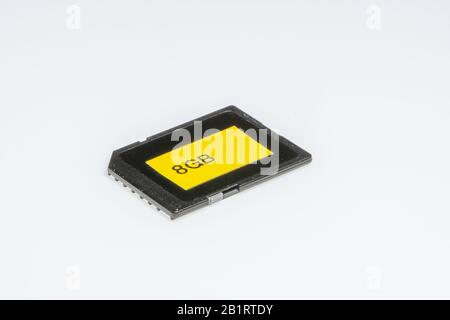 Detail of an 8 Gigabytes storage memory, on a white background Stock Photo