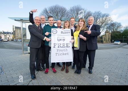 Edinburgh, UK. 27 February 2020. Pictured: L-R) Mark Ruskell MSP; Patrick Harvie MSP; Cameron Glasgow; Andy Wightman MSP; Ross Greer map; Alison Johnstone MSP; Cllr Gillian Mackay; John Finnie MSP. Ahead of the budget debate this afternoon Scottish Greens Parliamentary Co-Leaders Alison Johnstone MSP and Patrick Harvie MSP along with the Green MSP group will stage a photocall outside the Scottish Parliament to celebrate their free bus travel for under 19s budget win. The Scottish Greens yesterday announced that a deal had been struck on free bus travel, more money for councils, extra resou Stock Photo