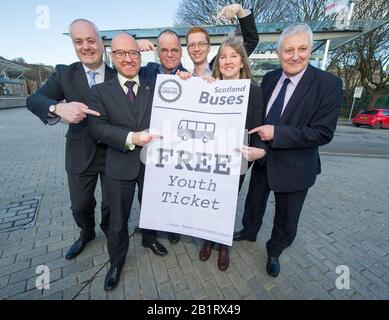 Edinburgh, UK. 27 February 2020. Pictured: (L-R) Mark Ruskell MSP; Patrick Harvie MSP; Andy Wightman MSP; Ross Greer map; Alison Johnstone MSP; John Finnie MSP. Ahead of the budget debate this afternoon Scottish Greens Parliamentary Co-Leaders Alison Johnstone MSP and Patrick Harvie MSP along with the Green MSP group will stage a photocall outside the Scottish Parliament to celebrate their free bus travel for under 19s budget win. The Scottish Greens yesterday announced that a deal had been struck on free bus travel, more money for councils, extra resource for community safety and an addit Stock Photo