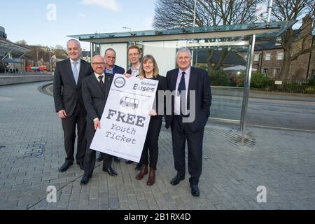 Edinburgh, UK. 27 February 2020. Pictured: (L-R) Mark Ruskell MSP; Patrick Harvie MSP; Andy Wightman MSP; Ross Greer map; Alison Johnstone MSP; John Finnie MSP. Ahead of the budget debate this afternoon Scottish Greens Parliamentary Co-Leaders Alison Johnstone MSP and Patrick Harvie MSP along with the Green MSP group will stage a photocall outside the Scottish Parliament to celebrate their free bus travel for under 19s budget win. The Scottish Greens yesterday announced that a deal had been struck on free bus travel, more money for councils, extra resource for community safety and an addit Stock Photo