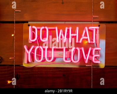 Do What You Love Neon Sign. Stock Photo