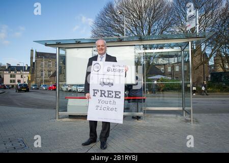 Edinburgh, UK. 27 February 2020. Pictured: Mark Ruskell MSP - Climate, Energy, Environment, Food & Farming and Scottish Green party MSP for Mid Scotland and Fife. Ahead of the budget debate this afternoon Scottish Greens Parliamentary Co-Leaders Alison Johnstone MSP and Patrick Harvie MSP along with the Green MSP group will stage a photocall outside the Scottish Parliament to celebrate their free bus travel for under 19s budget win. The Scottish Greens yesterday announced that a deal had been struck on free bus travel, more money for councils, extra resource for community safety and an add Stock Photo