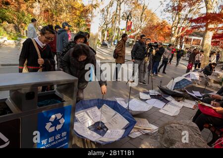 Marriage market in Hong Kou Park in Shanghai. Parents try to find a partner for their unwed children. Stock Photo