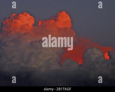 Red clouds at sunset,Skies Stock Photo
