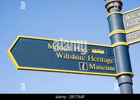 Metal signpost are an important aid to touring visitors to the Wiltshire market town of Devizes Stock Photo