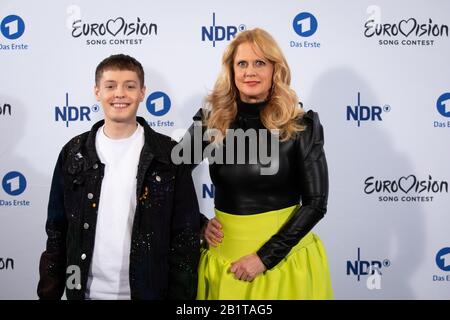 27 February 2020, Hamburg: The presenter Barbara Schöneberger (r) and the singer Ben Dolic during a photo session after announcing his participation in the final of the Eurovision Song Contest. The 22-year-old Slovenian will be competing for Germany at the ESC finals in Rotterdam on 16 May. There he will sing the song 'Violent Thing'. Photo: Christian Charisius/dpa Stock Photo