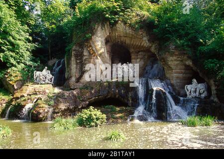 Statues and caves in the garden at the palace of Versailles near Paris Stock Photo