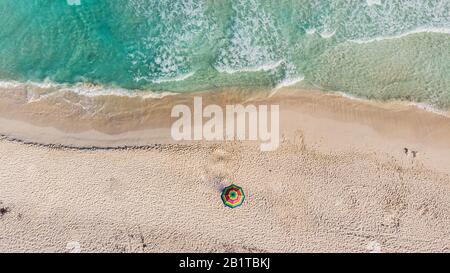 Lonely beach umbrella at Tulum beach Mexico North America Stock Photo