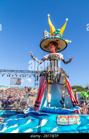 Nice, Cote d’Azur, France - February 15 2020: Carnaval de Nice, This years theme King of Fashion -  bright and colourful float with Queen of the flowe