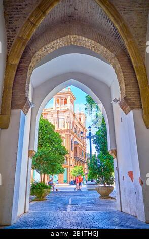 SEVILLE, SPAIN - OCTOBER 1, 2019:  The old Portillo De La Muralla gates of the medieval city walls, nowadays the remains of historical defensive forti Stock Photo