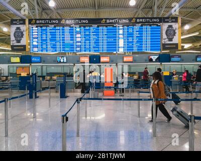 Athens, Greece - February, 11 2020: Athens International Airport Eleftherios Venizelos. Passengers in the departure hall of the main terminal going to Stock Photo