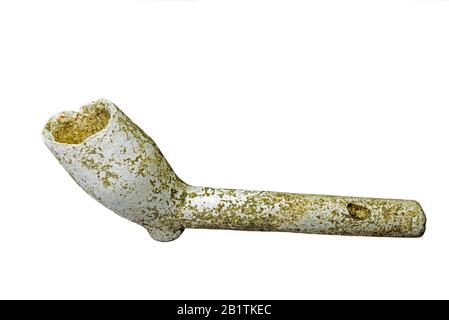 Fragment of 17th century clay tobacco pipe / ceramic pipe against white background Stock Photo