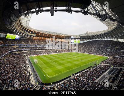 Elevated view across stadium bowl during match. The New Tottenham Hotspur Stadium, London, United Kingdom. Architect: Populous, 2019. Stock Photo