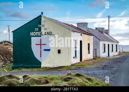 ROSSBEG / IRELAND - FEBRUARY 20 2020 : Historic painted cottages. Stock Photo