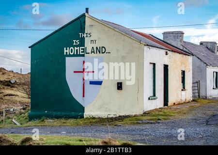 ROSSBEG / IRELAND - FEBRUARY 20 2020 : Historic painted cottages. Stock Photo